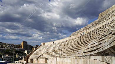 Roman Theatre in Amman, Jordan. Against the sky with clouds. 4K, time lapse