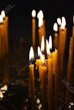 Burning candles in a church