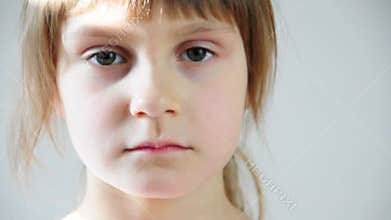 Portrait of a happy little girl looking