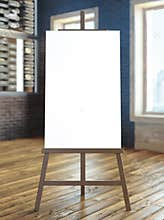 Easel with blank canvas in interior