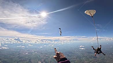 Skydiving airplane diving after dropping skydivers