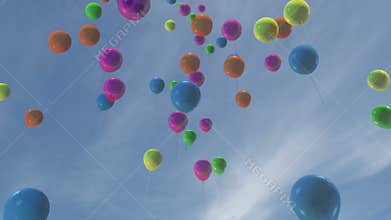 Multi-colored balloons floating in a blue sky