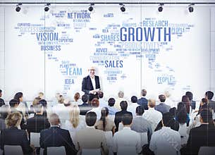 Business People Listening to a Presentation About Growth