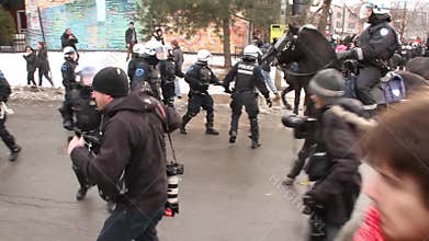 Riot officer uses baton to push away protesters - HD 1080p