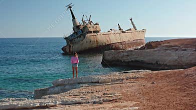 Woman exploring EDRO III shipwreck in Cyprus Paphos coast