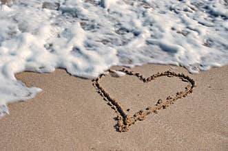 Seascape. Love, summer, sea, sun, beach, fun, holiday and a big heart on the sand