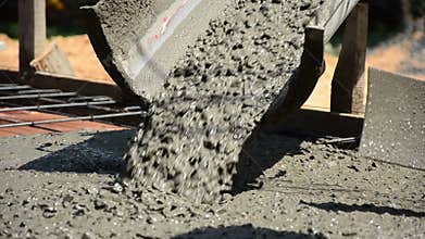 Pouring concrete liquid to block