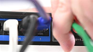 The internet cable is plugged into the router.