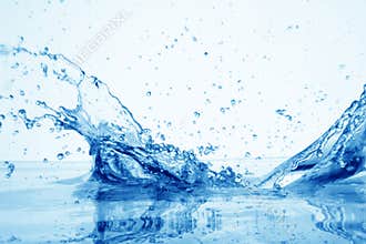 Drop of water in puddle in blue