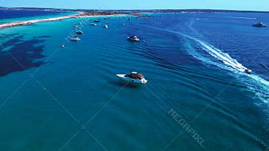 Luxurious yachts in turquoise clear blue waters Amazing aerial view flight drone