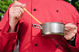 Chef preparing food, isolated
