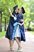 Two young woman graduate