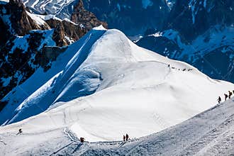 Mont Blanc, Chamonix, French Alps. France. - tourists climbing u