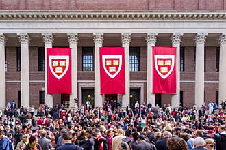 Students of Harvard University gather for their graduation ceremonies on Commencement Day