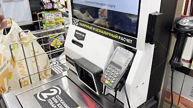 Minsk Belarus October 15 2025 Person using self check-out