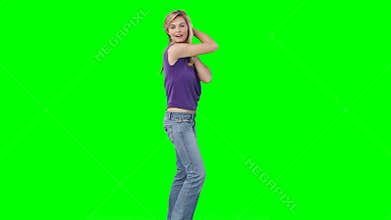 A woman dancing as she turns around