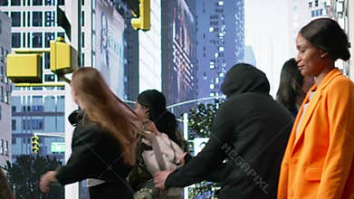 Robbery in broad daylight captures male bandit grabbing bag from gen z girl