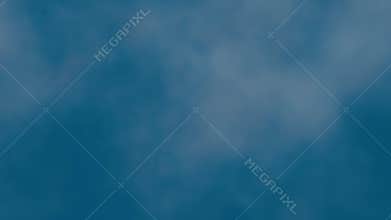 Seamless loop background with realistic flying through sparse white clouds in a deep blue sky