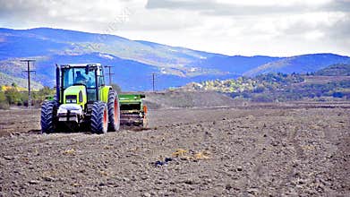 Tractor at work on farm land