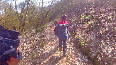 Chasing and running after boy in the forest