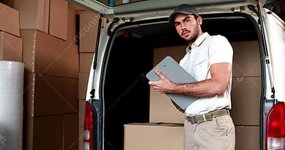 Delivery driver checking his list