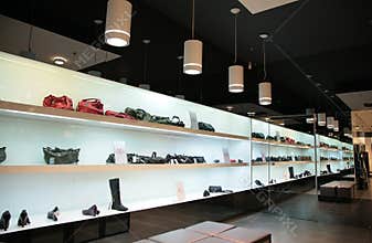 Shelfs in store with bags and shoes