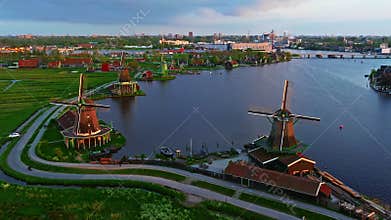 Aerial view of windmills at famous tourist site Zaanse Schans in Holland on sunset. Zaandam, Netherlands