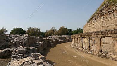Dharmarajika Stupa surrounded by quiet ancient alley