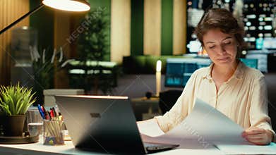 Project manager fixing targets and agenda after hours for evolution