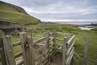Coastal path gate to Duckpool beach in Cornwall