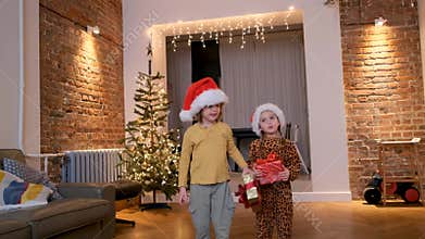 Joyful Children Celebrating Christmas Together with Colorful Gifts and Festive Decorations