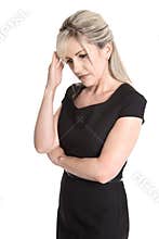 Sad and sorrowful isolated woman in black dress isolated over white.