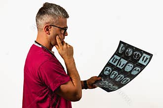 Medical professional analyzing diagnostic images in a clinical setting