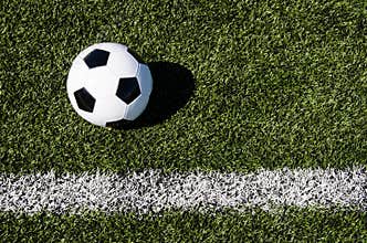 Soccer ball and boundary line