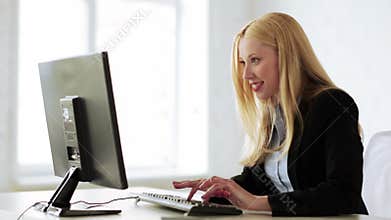 Business woman with triumph expression in office