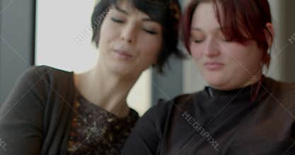 Women sharing warmth, Comfortable ladies linking fingers closely