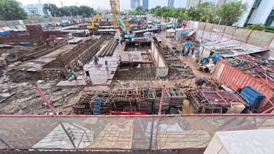High angle view shows Workers constructing .