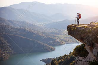 Female hiker standing on cliff