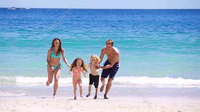 Happy family splashing each other