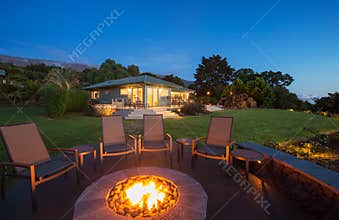 Firepit outside of an estate home