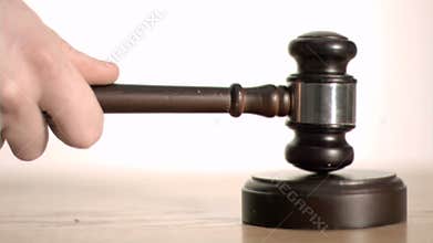 Gavel in super slow motion being held