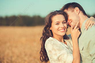 Young couple in love outdoor. Couple hugging.
