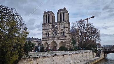 Classic view of the Seine River in Paris, leading toward the iconic Notre-Dame Cathedral