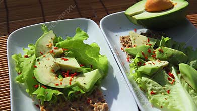 Crispbread with salad and avocado top view. Healthy healthy Breakfast