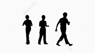 Silhouette Group of builders walk in the frame and dance.