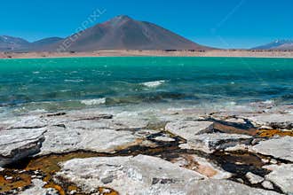 Laguna Verde green water lagoon lake and volcano in Chile mountains of Altiplano
