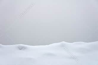 Winter Snow Line Against Overcast Gray Sky