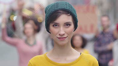 Determined young woman in protest