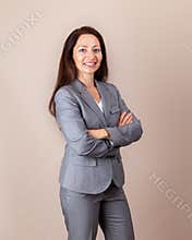 Portrait of a beautiful woman or business woman lady in gray suit