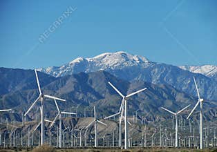 Desert wind turbines near Palm Springs, California, with mountains